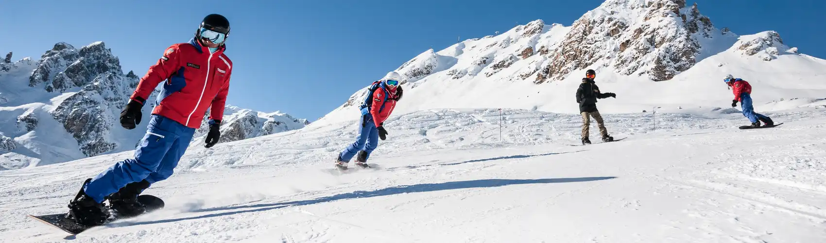 Start snowboarding or skiing